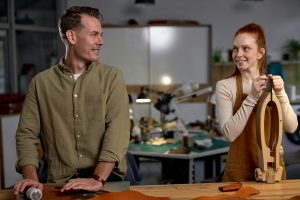 young couple flirts, smiling to each other